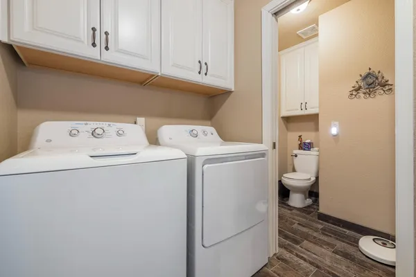 a utility room with dryer and washer