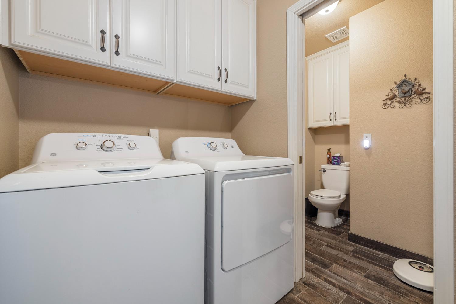 1084 Eastburg Court Ripon, CA 95366 - Photo 16 of 46 a utility room with dryer and washer
