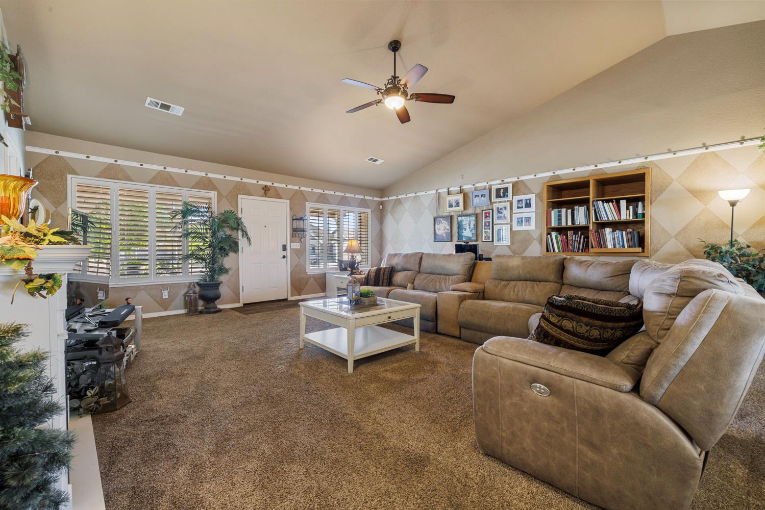 1084 Eastburg Court Ripon, CA 95366 - Photo 9 of 46 a living room with furniture and a large window