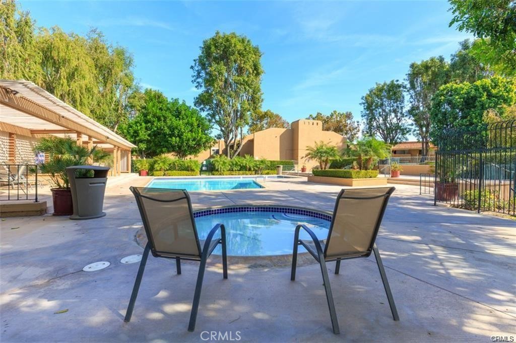 1101 West MacArthur Boulevard Santa Ana, CA 92707 - Photo 13 of 16 a patio with table and chairs