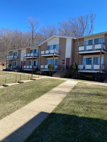 a view of a big yard next to a building