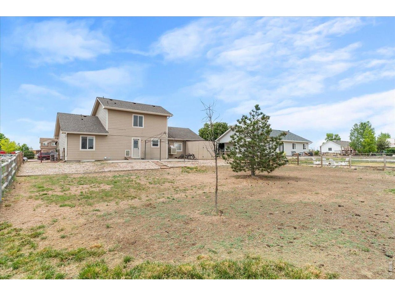 804 7th Street Pierce, CO 80650 - Photo 29 of 31 Large Backyard with plenty of space to entertain! Storage Shed off the side of the home perfect for storing yard tools.
