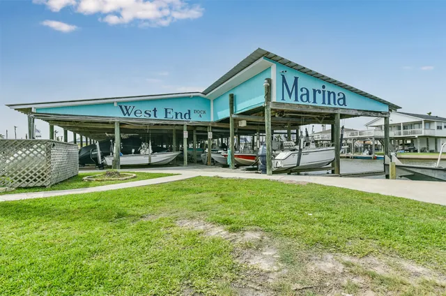 a view of a chairs and table in the patio