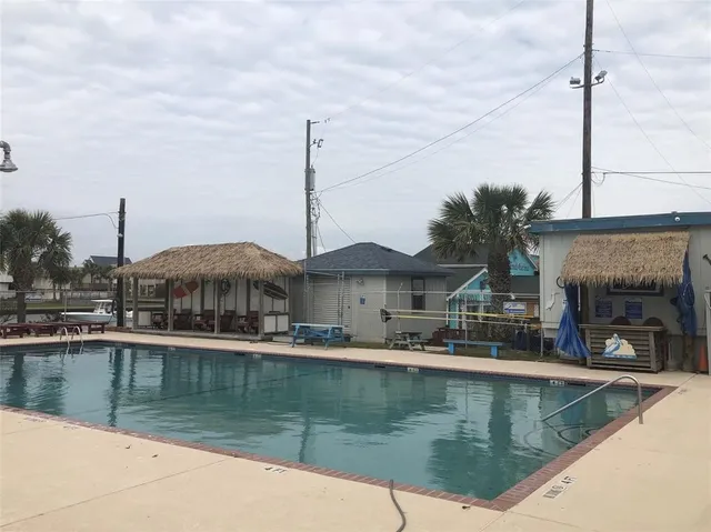a view of a lake with a lake and palm trees