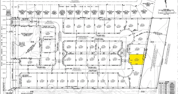 a picture of a glass window with painted white wall and next to a large window