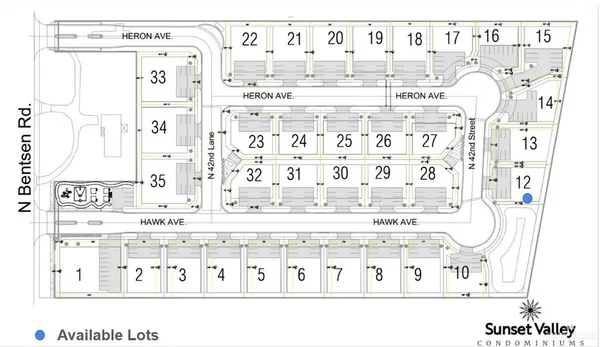 a kitchen with stainless steel appliances granite countertop a refrigerator a sink and a stove