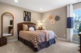 8670 Burr Rdg Circle Crown Point, IN 46307 - Photo 15 of 36 a bedroom with a bed and window