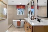 8670 Burr Rdg Circle Crown Point, IN 46307 - Photo 16 of 36 a bathroom with a sink and a mirror