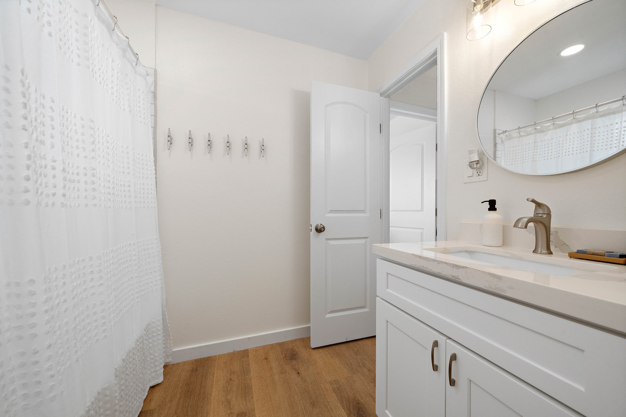 104 Marlin Avenue Freeport, TX 77541 - Photo 24 of 43 a bathroom with a sink and a mirror