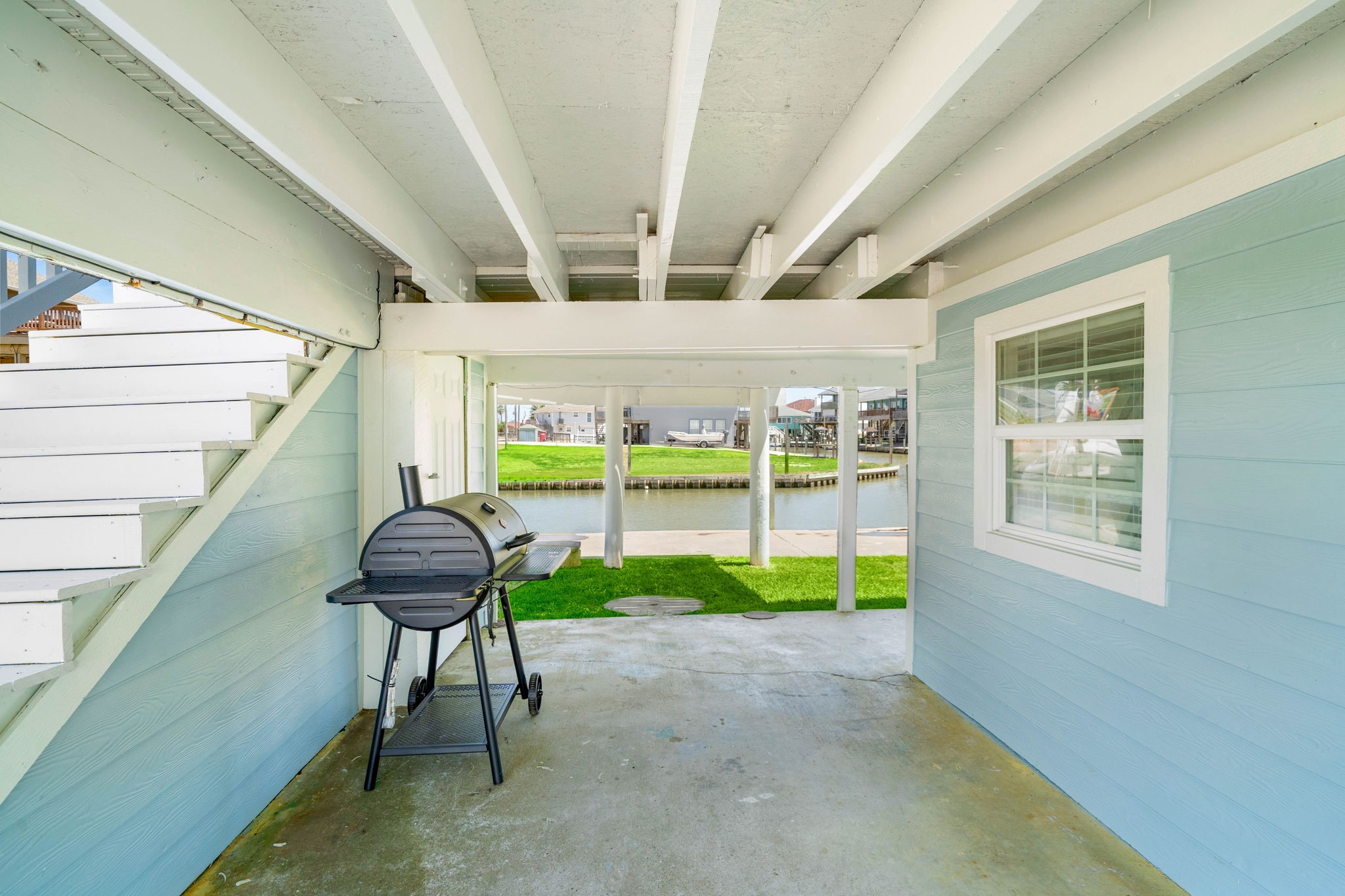 104 Marlin Avenue Freeport, TX 77541 - Photo 30 of 43 a view of a porch with furniture and a yard