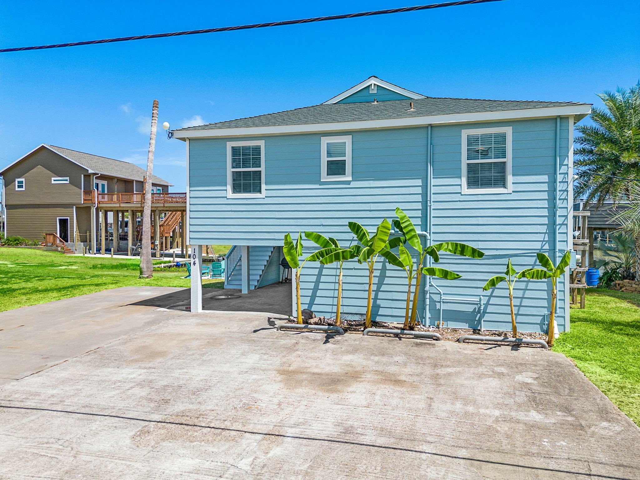 104 Marlin Avenue Freeport, TX 77541 - Photo 4 of 43 a view of a house with a yard