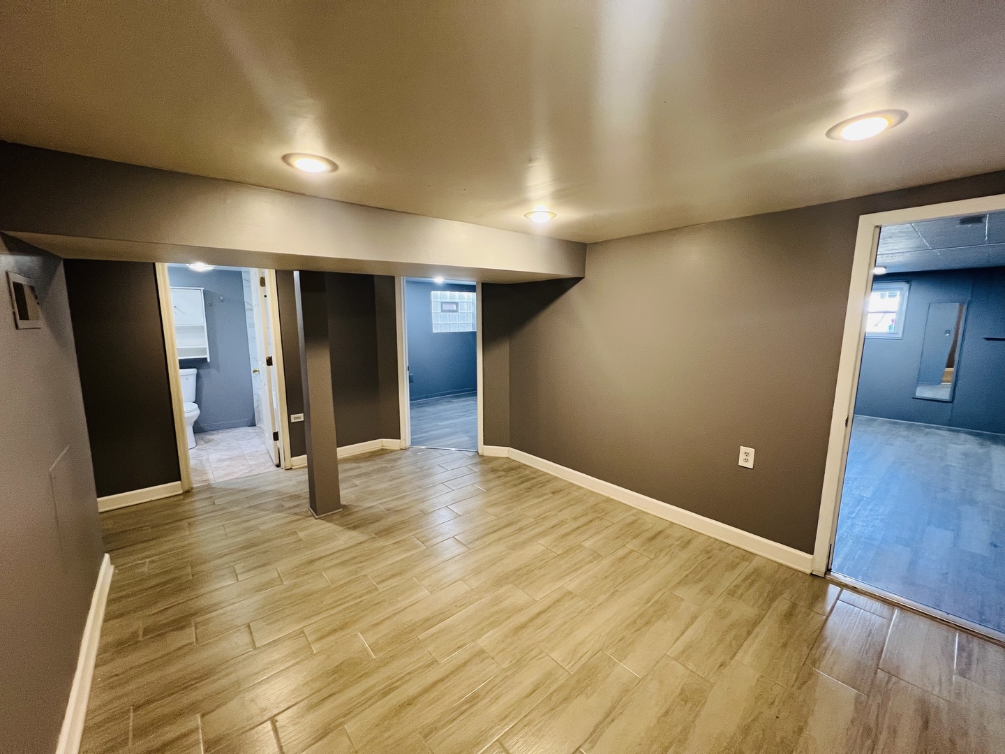 3516 North Keating Avenue, Unit G Chicago, IL 60641 - Photo 16 of 20 a view of empty room with wooden floor