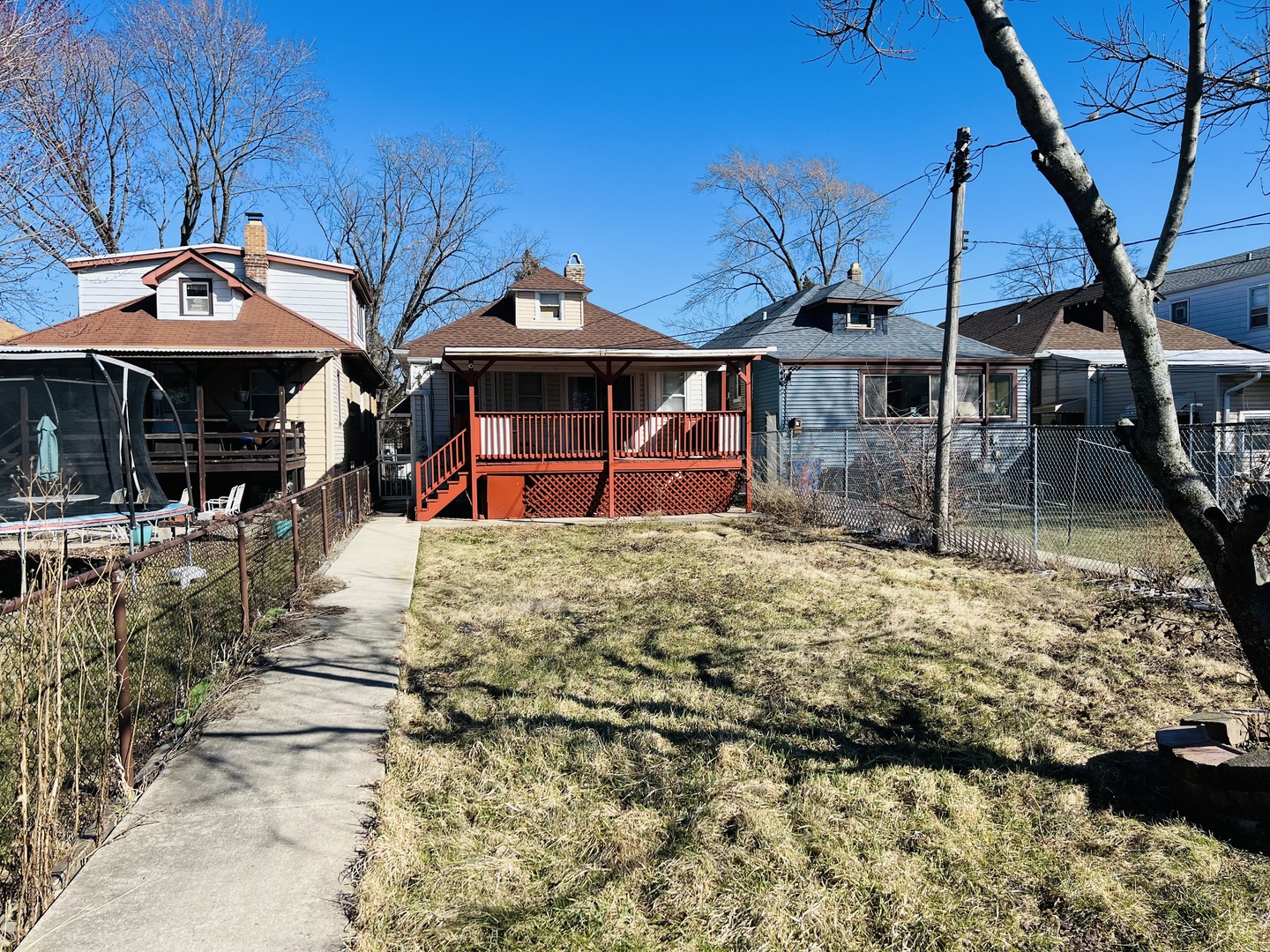 3516 North Keating Avenue, Unit G Chicago, IL 60641 - Photo 19 of 20 a view of a house with a yard