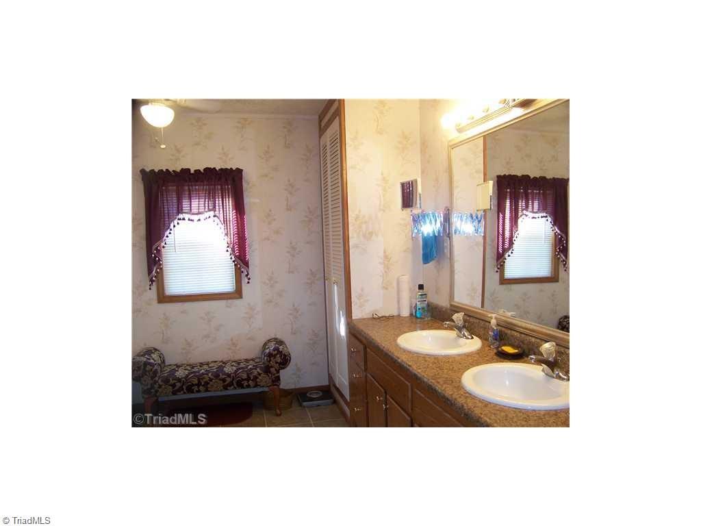 1137 Thayer Road Trinity, NC 27370 - Photo 10 of 14 Dual vanity with storage and shower in master bath