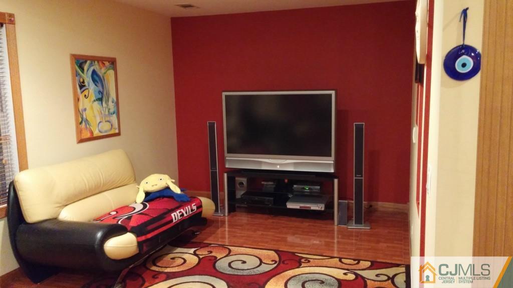 37 Rainford Road Edison, NJ 08820 - Photo 2 of 18 a living room with furniture and a flat screen tv