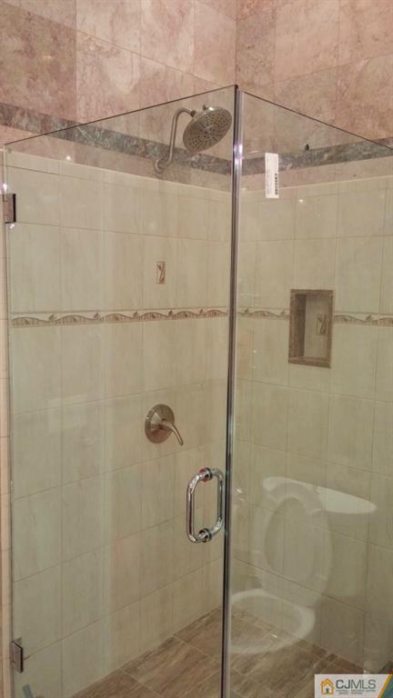37 Rainford Road Edison, NJ 08820 - Photo 12 of 18 a bathroom with a shower