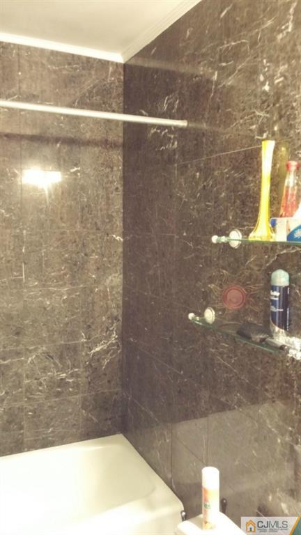 37 Rainford Road Edison, NJ 08820 - Photo 5 of 18 a bathroom with a shower