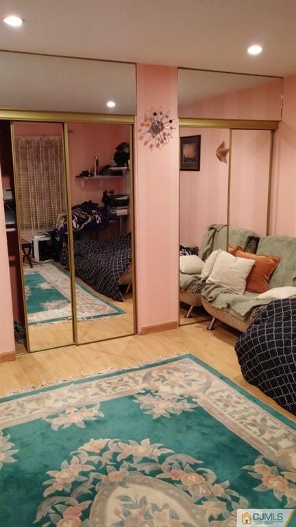 37 Rainford Road Edison, NJ 08820 - Photo 6 of 18 a bedroom with a bed and walk in closet