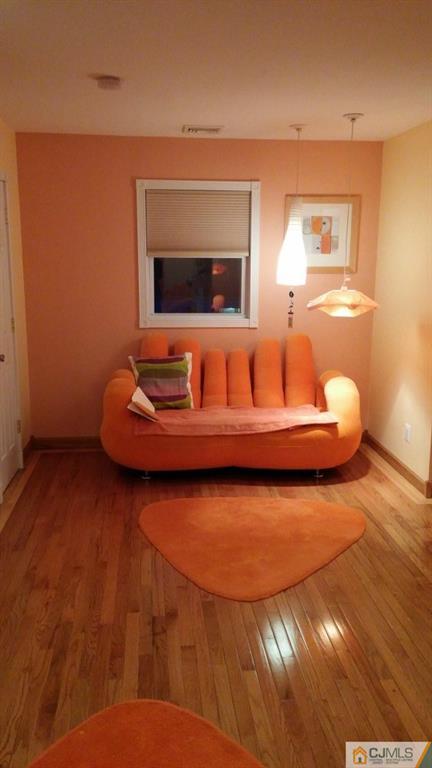 37 Rainford Road Edison, NJ 08820 - Photo 8 of 18 a living room with furniture and a flat screen tv