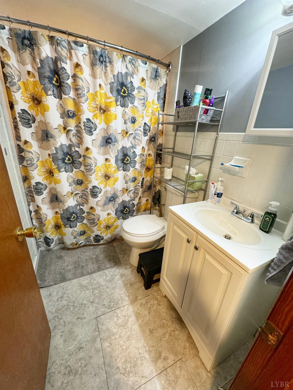 2961 Grit Road Hurt, VA 24563 - Photo 11 of 13 a bathroom with a sink toilet and shower