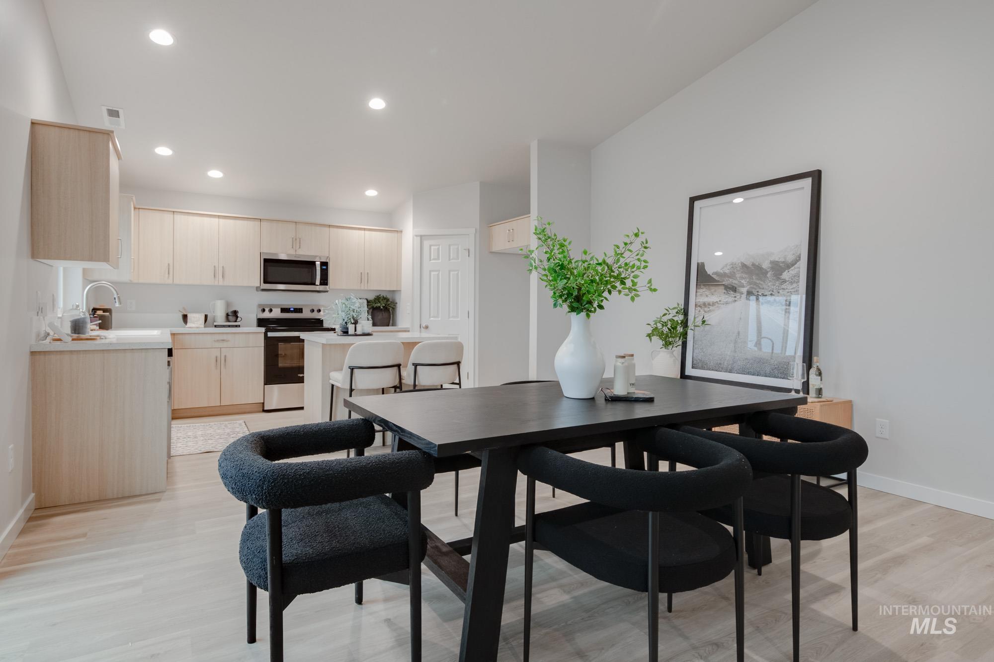 1776 West Unforgettable Street Meridian, ID 83642 - Photo 11 of 28 Dining area with recessed lighting and light wood finished floors