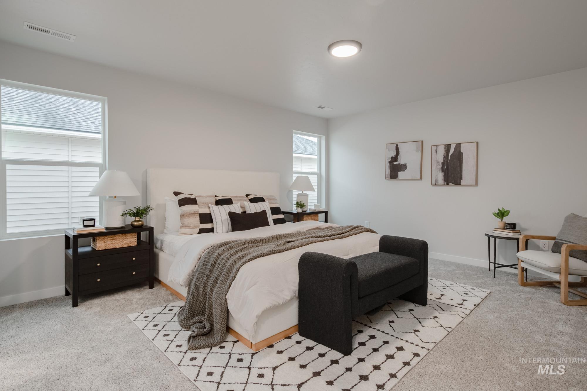 1776 West Unforgettable Street Meridian, ID 83642 - Photo 18 of 27 Bedroom featuring light colored carpet