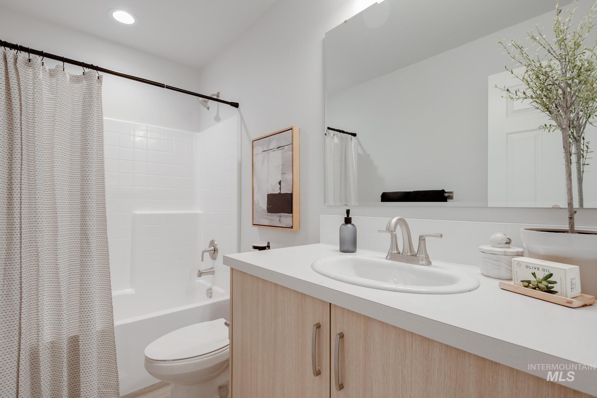 1776 West Unforgettable Street Meridian, ID 83642 - Photo 25 of 28 Bathroom with shower / tub combo, vanity, and recessed lighting