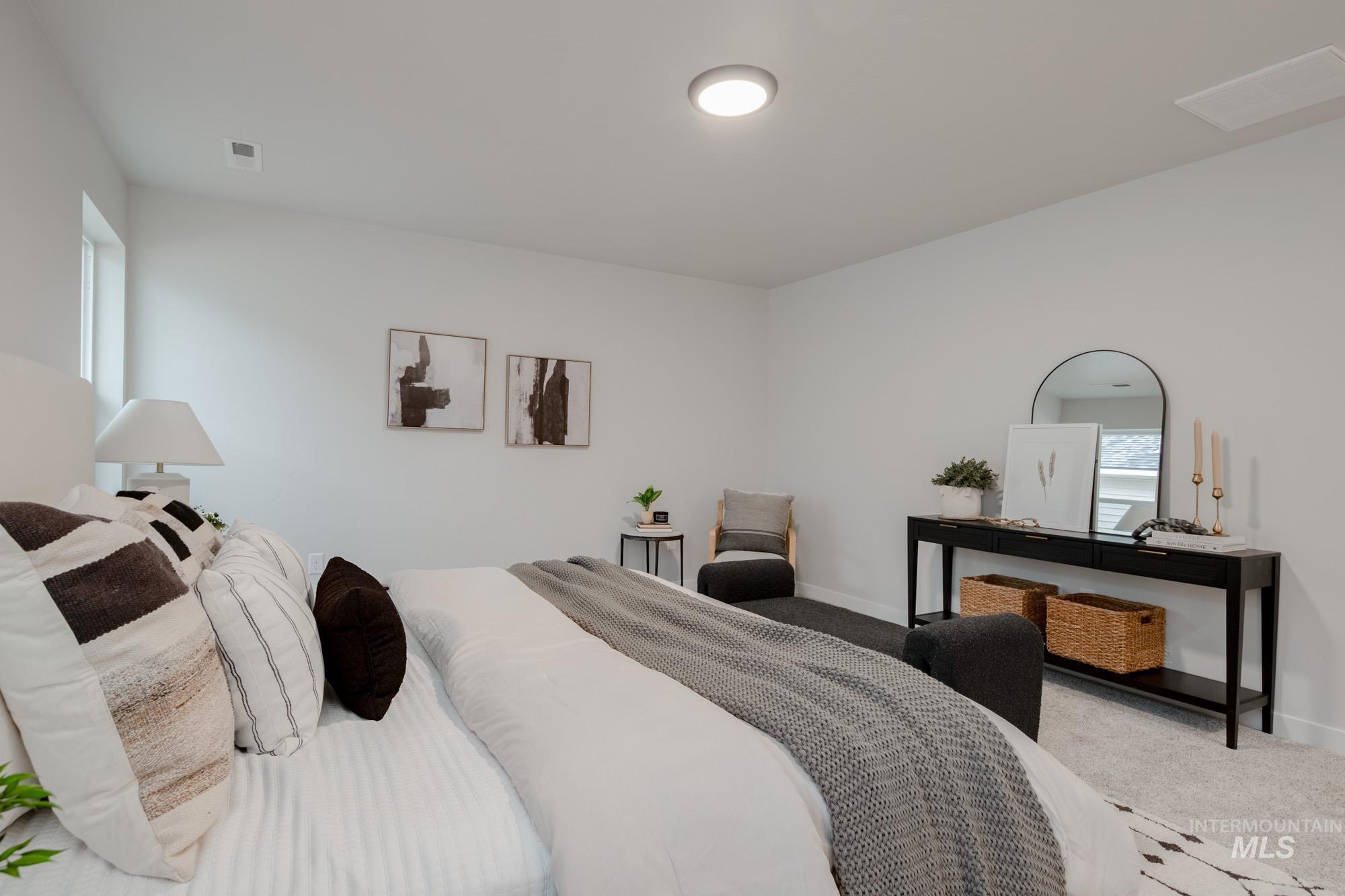 1776 West Unforgettable Street Meridian, ID 83642 - Photo 25 of 27 Carpeted bedroom featuring multiple windows