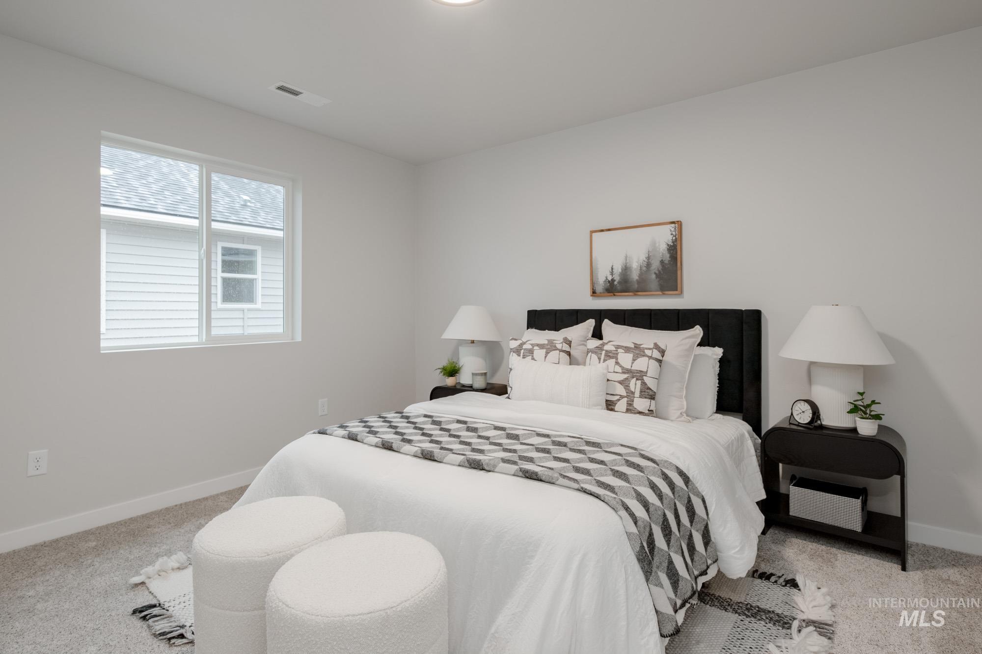 1776 West Unforgettable Street Meridian, ID 83642 - Photo 27 of 28 Bedroom with carpet and baseboards