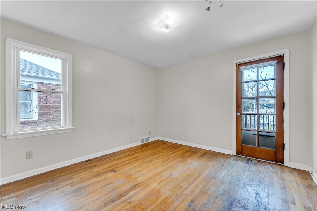 13566 Cedar Road Cleveland, OH 44118 - Photo 44 of 49 Spare room with light wood-type flooring and plenty of natural light