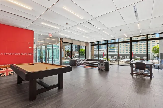 a room with furniture and wooden floor