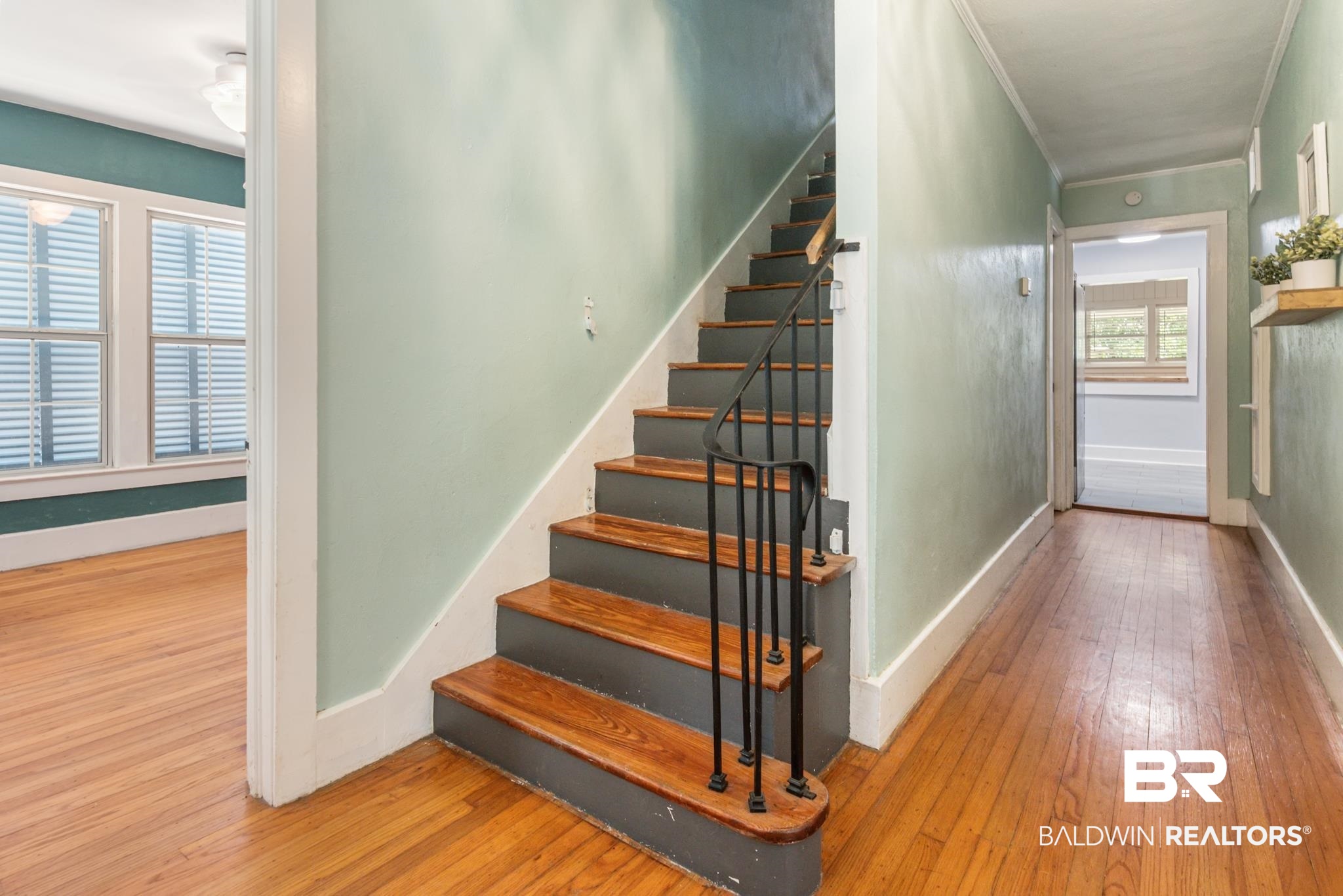 114 Crenshaw Street Mobile, AL 36606 - Photo 8 of 49 Stairway featuring hardwood / wood-style flooring, ornamental molding, and plenty of natural light