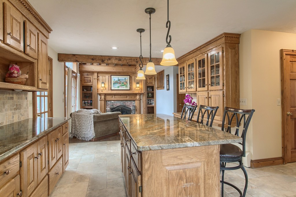 2 Ryan Road Townsend, MA 01474 - Photo 15 of 30 a dining room with furniture a chandelier and wooden floor