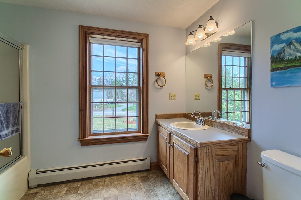 2 Ryan Road Townsend, MA 01474 - Photo 25 of 30 a bathroom with a sink a vanity and a toilet