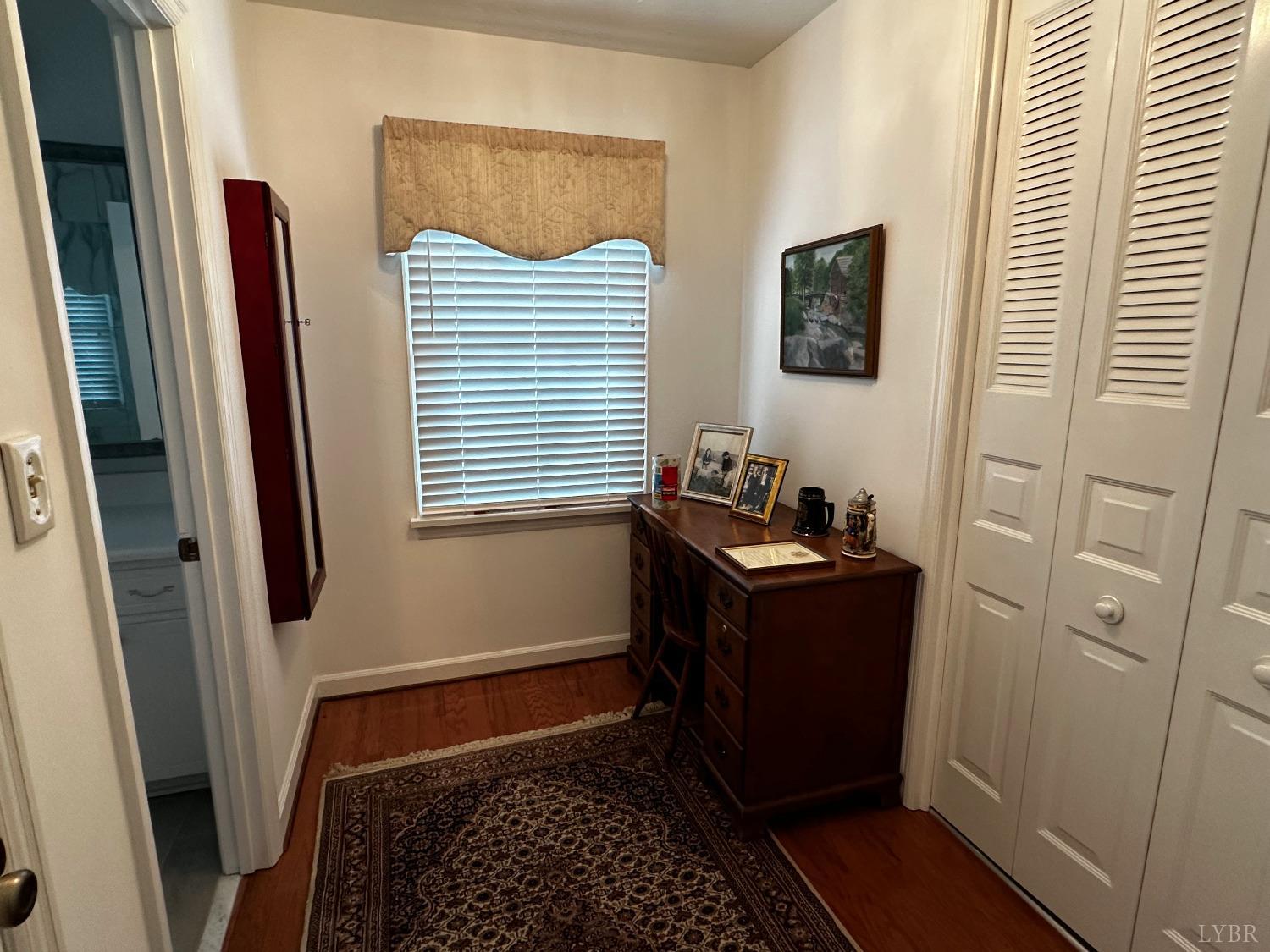 1687 Pilgrim Road Forest, VA 24551 - Photo 14 of 42 a room with a window and a mirror