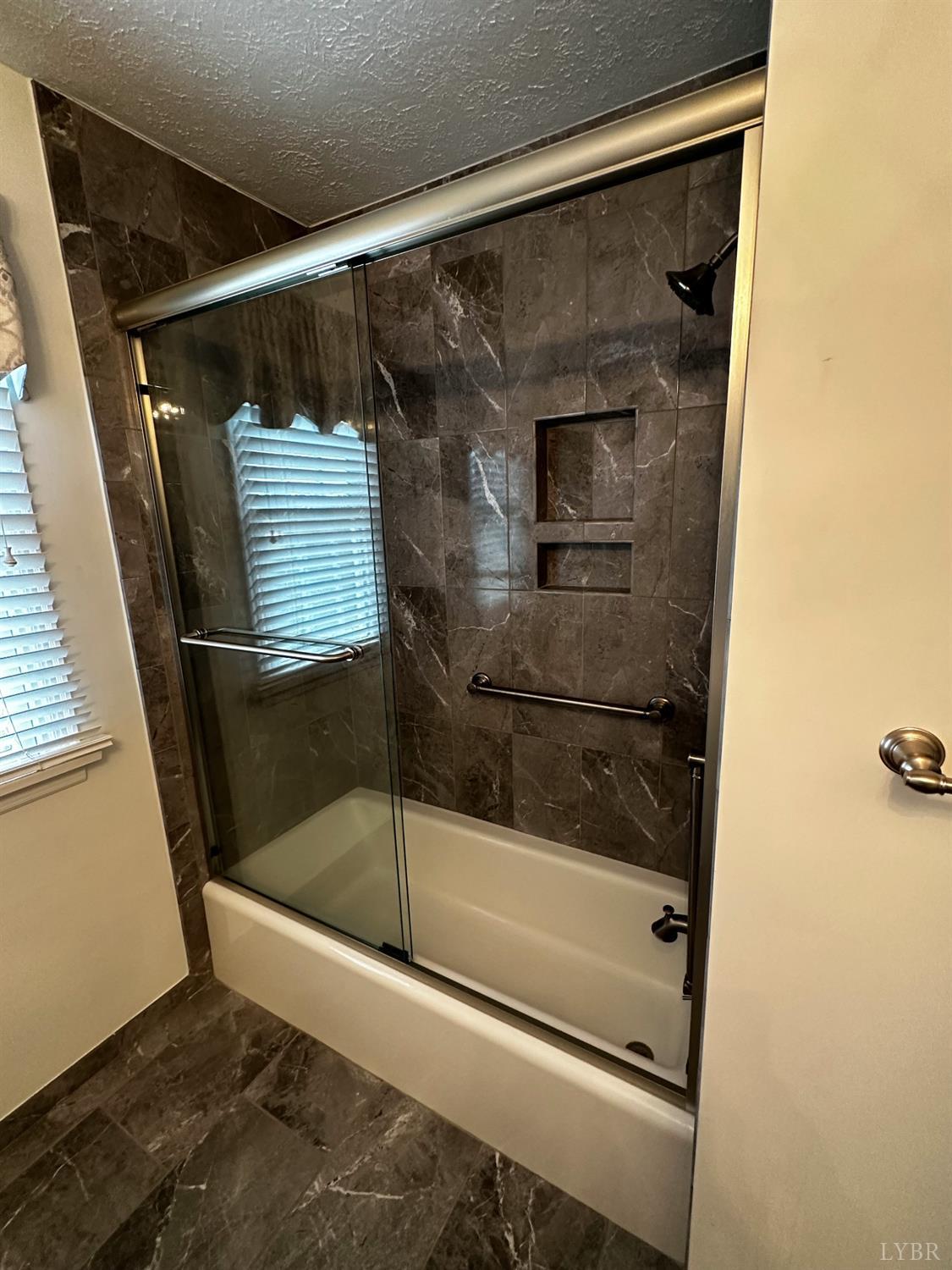1687 Pilgrim Road Forest, VA 24551 - Photo 19 of 42 a bathroom with a shower and toilet