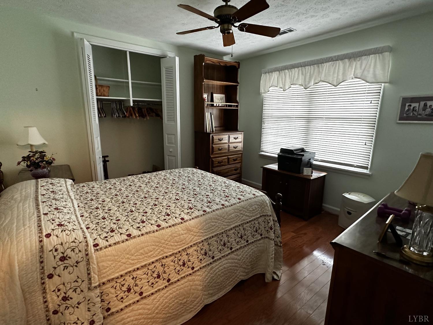 1687 Pilgrim Road Forest, VA 24551 - Photo 20 of 42 a bed sitting in a bedroom next to a window