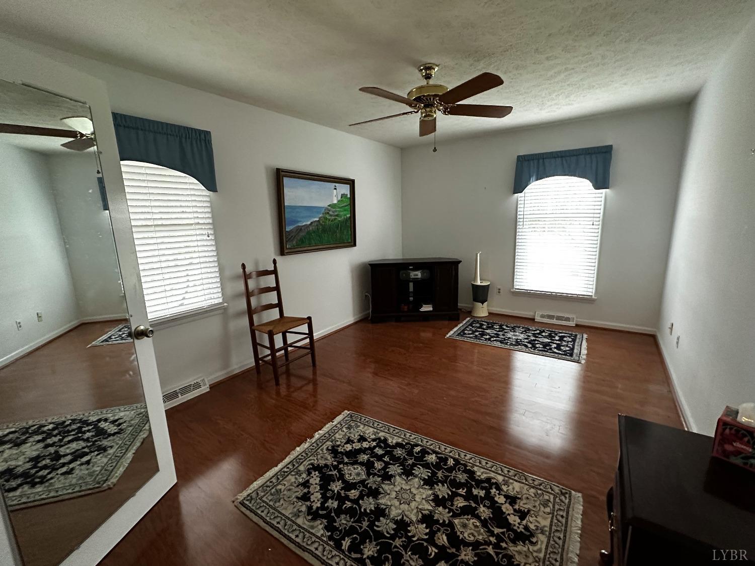 1687 Pilgrim Road Forest, VA 24551 - Photo 21 of 42 a living room with furniture and a window