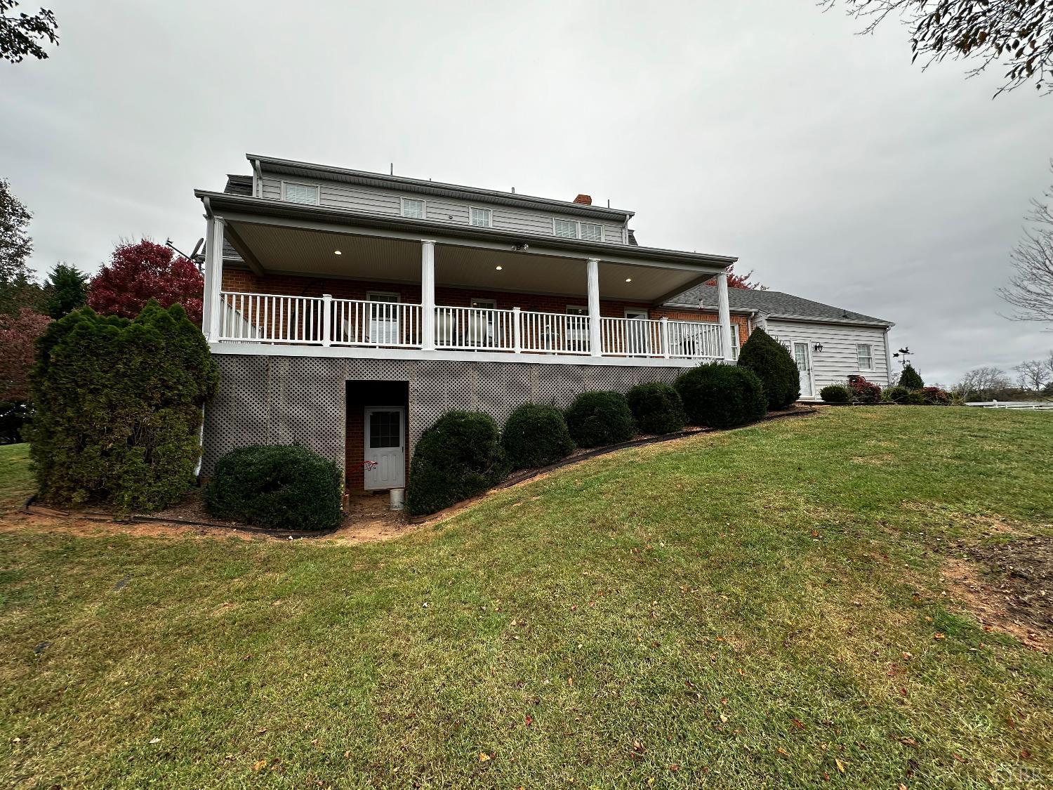 1687 Pilgrim Road Forest, VA 24551 - Photo 3 of 42 a front view of a house with a yard