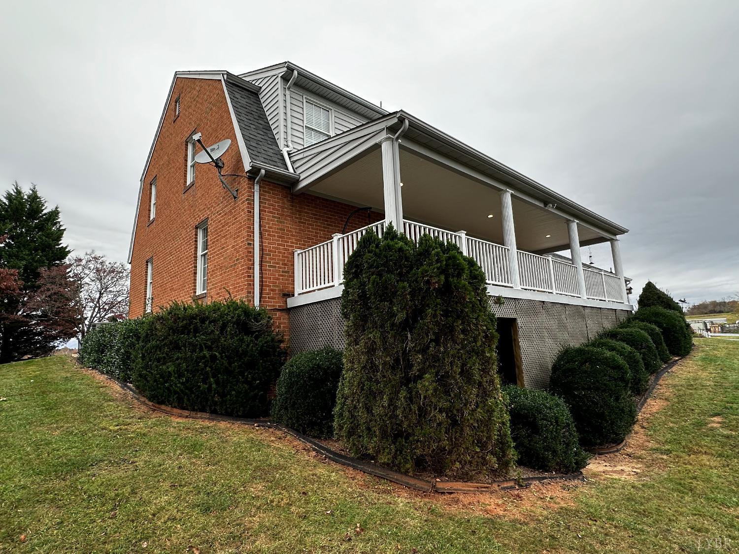 1687 Pilgrim Road Forest, VA 24551 - Photo 5 of 42 a front view of house with a yard