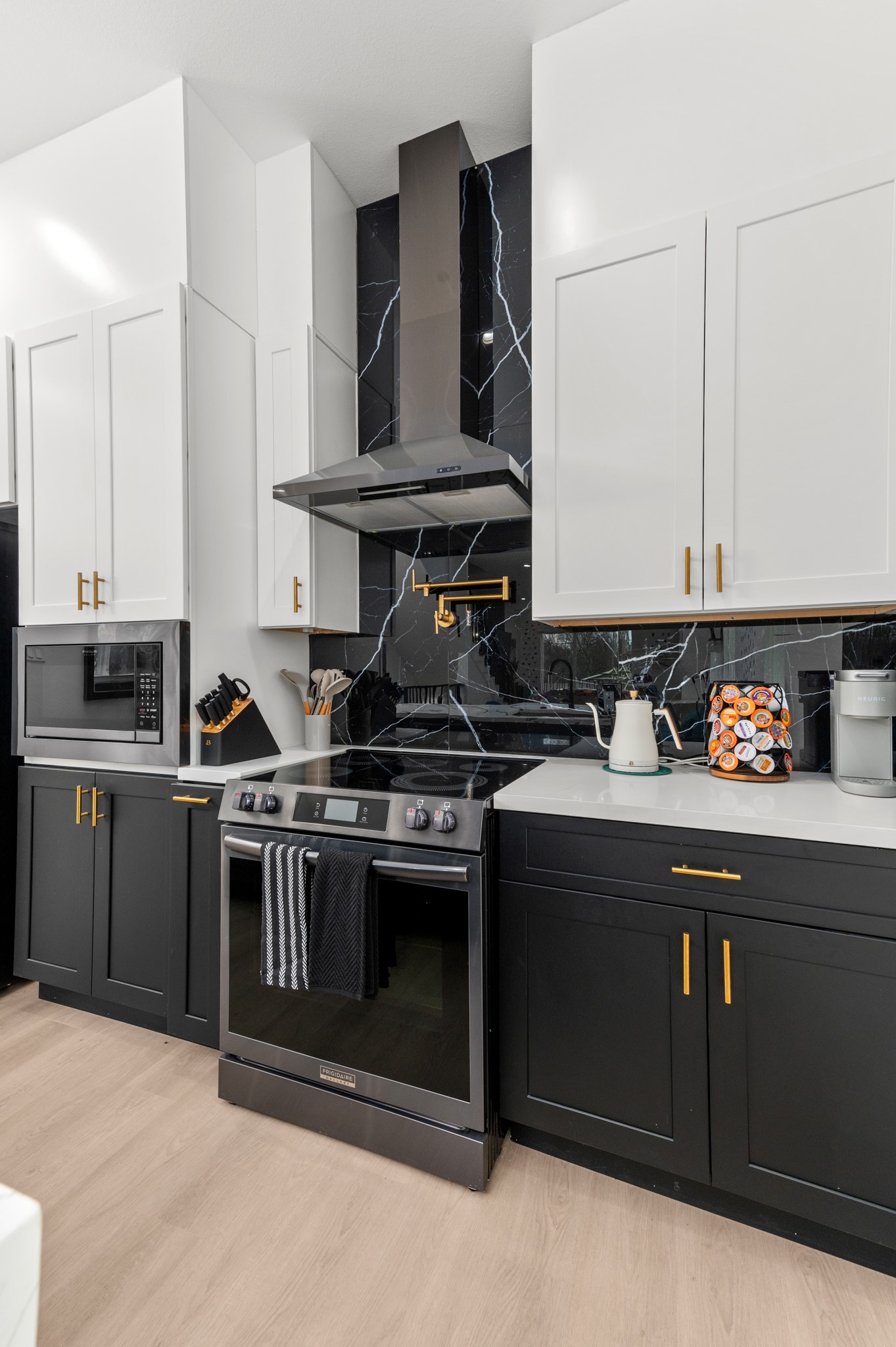 3313 Hadley Street, Unit B Houston, TX 77004 - Photo 17 of 26 a kitchen with stainless steel appliances a stove a sink and cabinets