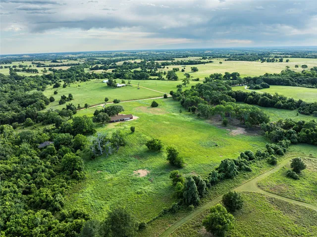 a view of a green field with lots of green space