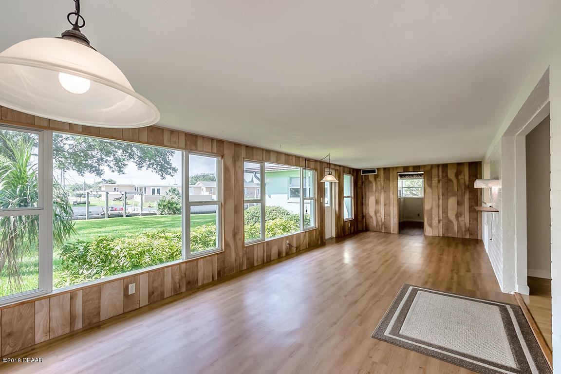 137 Reef Road South Daytona, FL 32119 - Photo 24 of 49 a view of an entryway with wooden floor