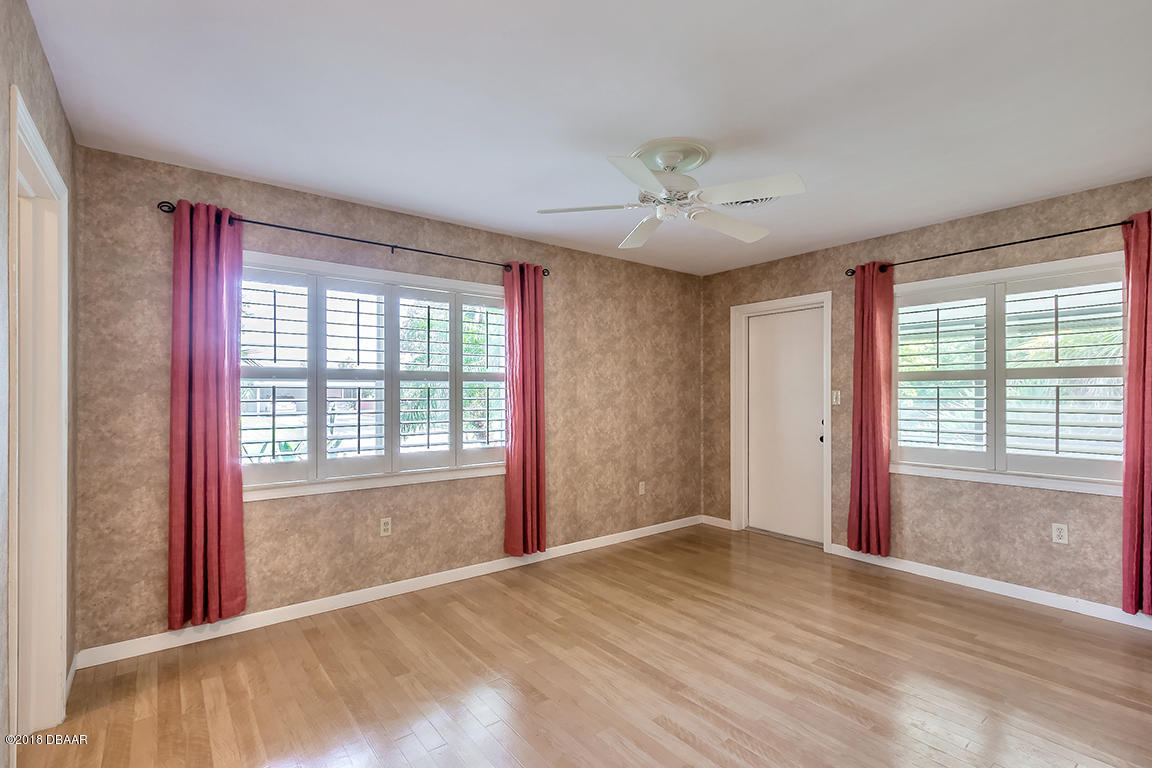 137 Reef Road South Daytona, FL 32119 - Photo 29 of 49 a view of an empty room with a window