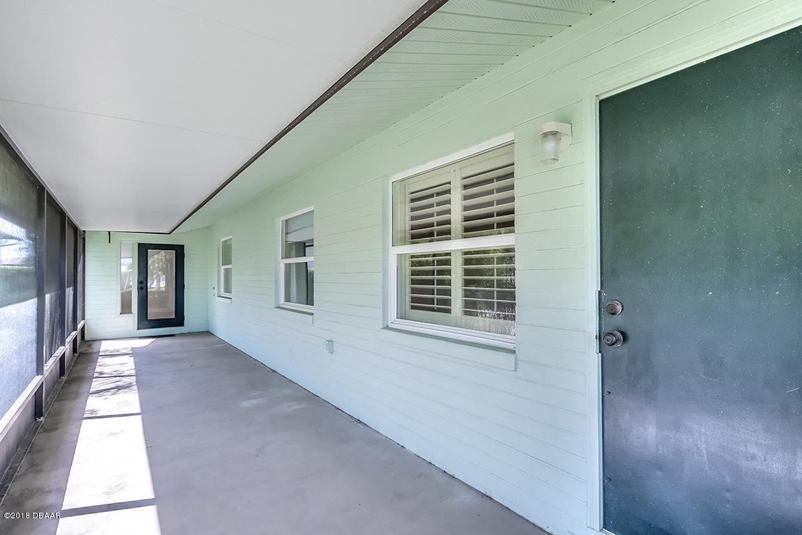 137 Reef Road South Daytona, FL 32119 - Photo 44 of 49 a view of an empty room and window