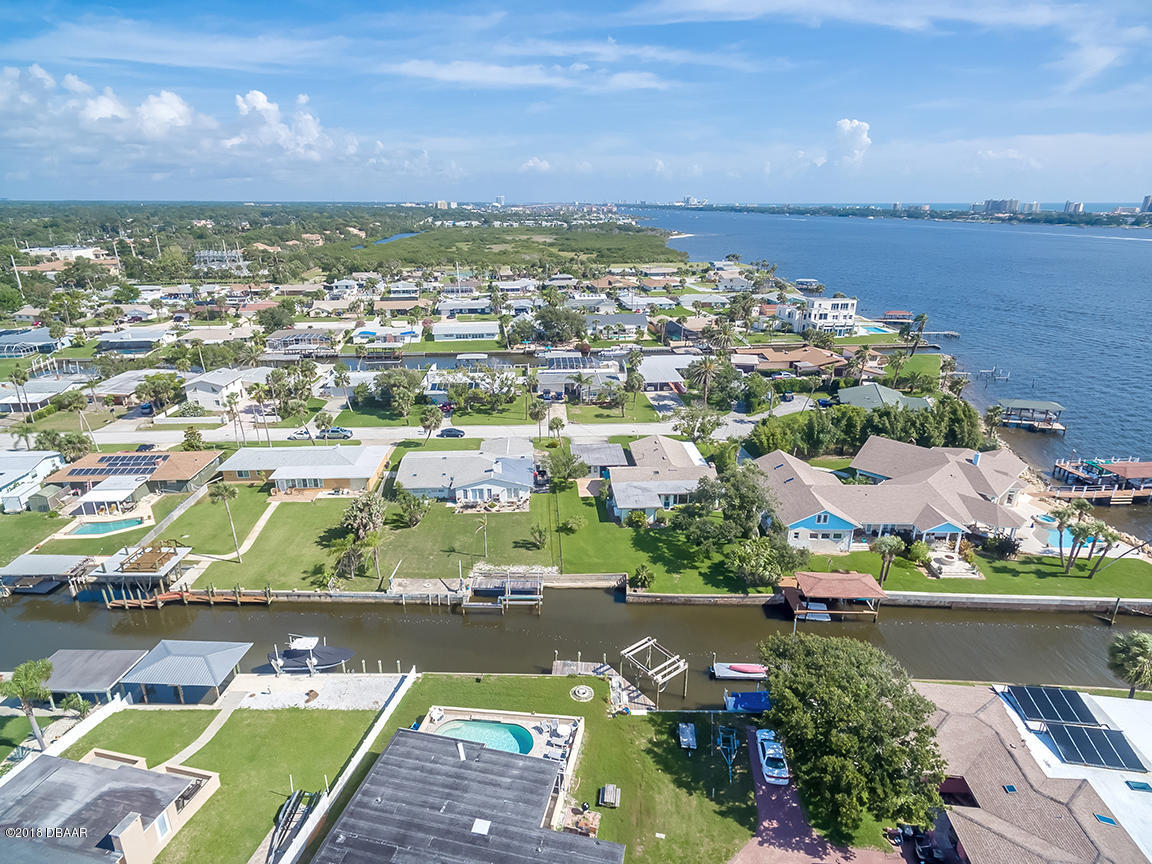 137 Reef Road South Daytona, FL 32119 - Photo 5 of 49 an aerial view of a city with outdoor space