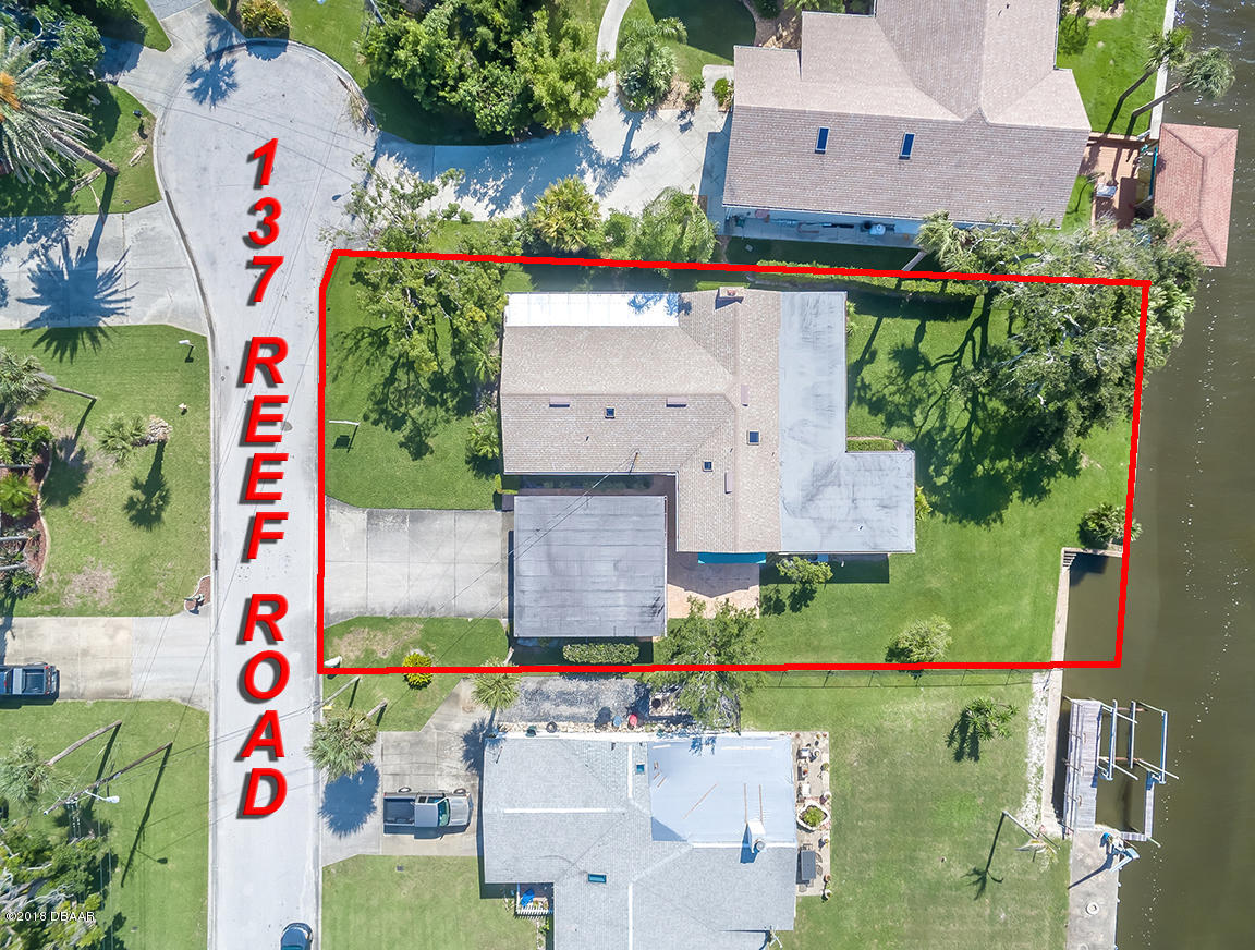 137 Reef Road South Daytona, FL 32119 - Photo 7 of 49 an aerial view of a houses with outdoor space