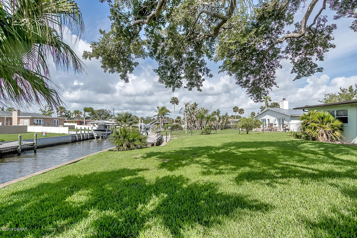 137 Reef Road South Daytona, FL 32119 - Photo 8 of 49 a view of a park with large trees