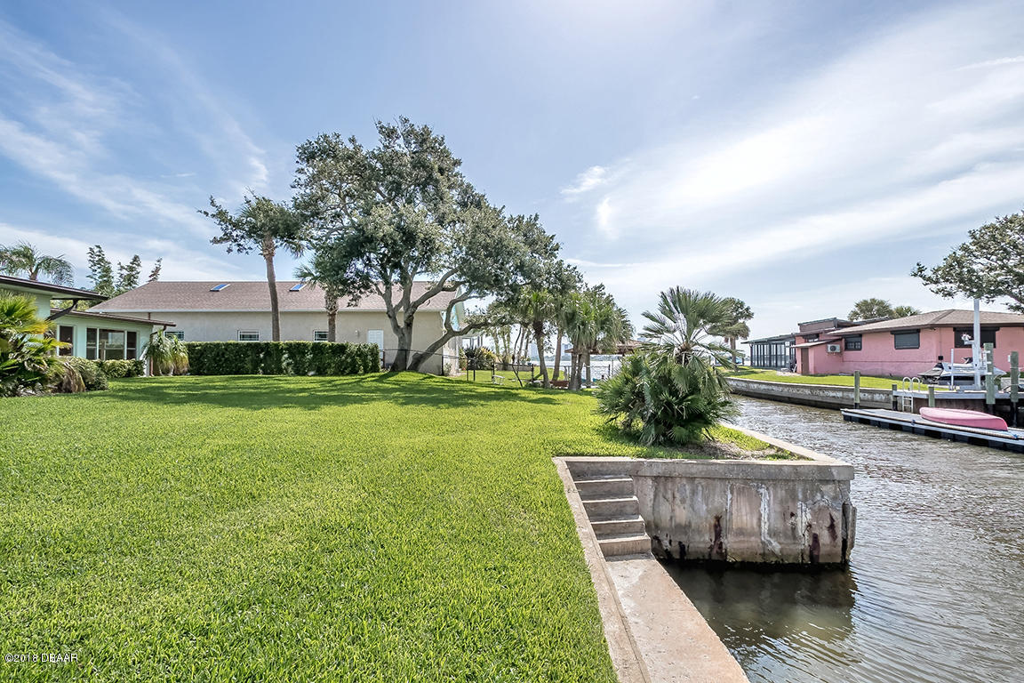 137 Reef Road South Daytona, FL 32119 - Photo 9 of 49 a view of a house with a garden