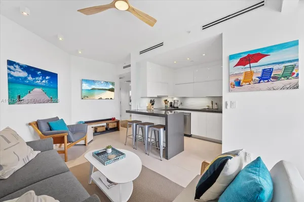 a living room with furniture and a couch